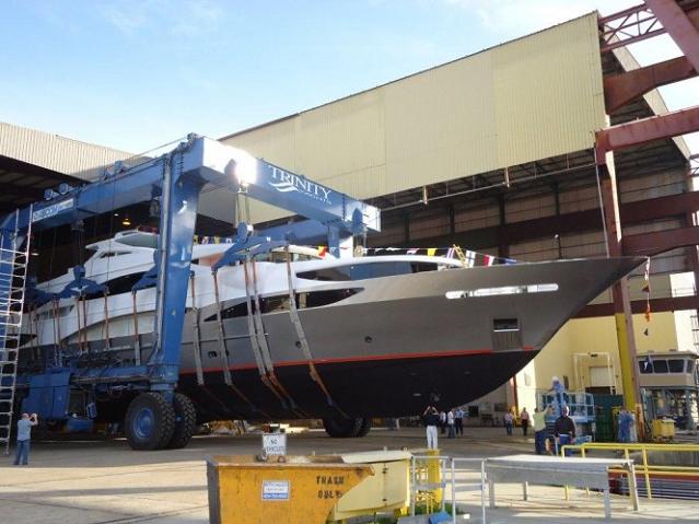 TSUMAT-Trinity-Yachts-T057-Bedecked-in-Flags-Ready-to-Splash-Photo-Credit-Trinity-Yachts-665x498.jpg